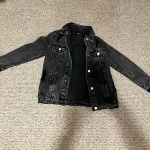 Black jean jacket with rips